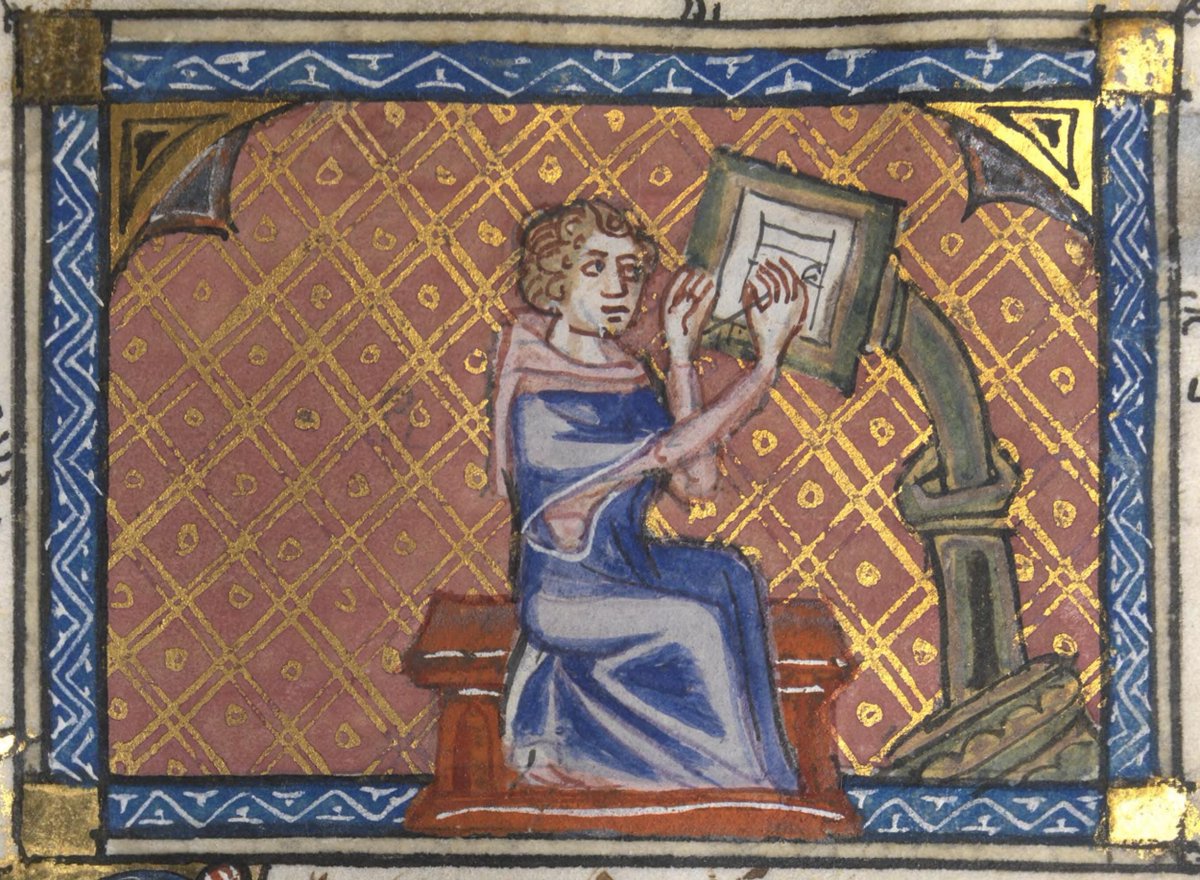 Illustration from a fourteenth-century manuscript of 'Roman de la Rose'. There's a richly coloured and patterned background, gold-edged. A sideways seated scribe, wearing a blue robe, is writing. Their desk is like an easel, vertical and at the scribe's head height.