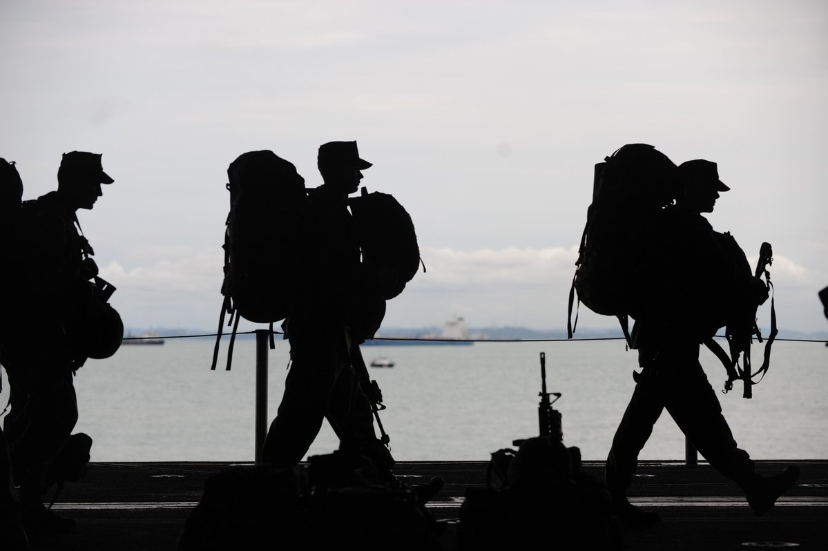 Silhouete of soldier's walking.
